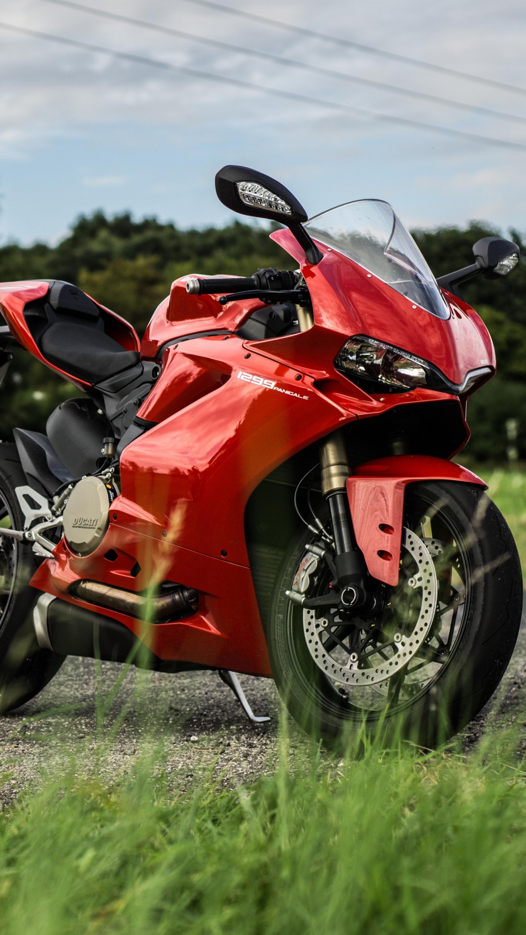 Red and Black Sports Bike on Road During Daytime. Wallpaper in 1080x1920 Resolution