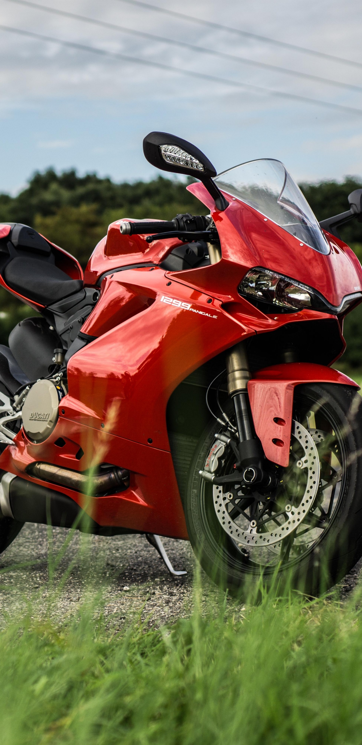 Red and Black Sports Bike on Road During Daytime. Wallpaper in 1440x2960 Resolution