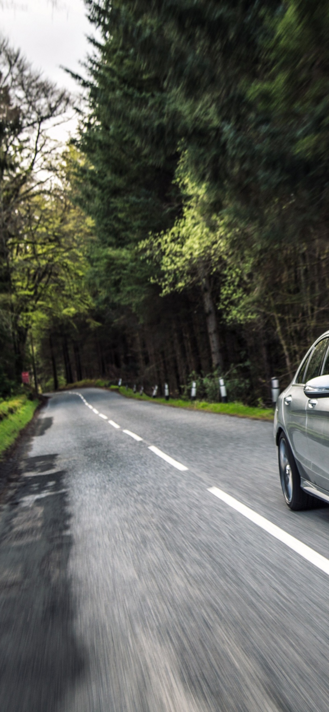 Black Mercedes Benz Coupe on Road During Daytime. Wallpaper in 1125x2436 Resolution