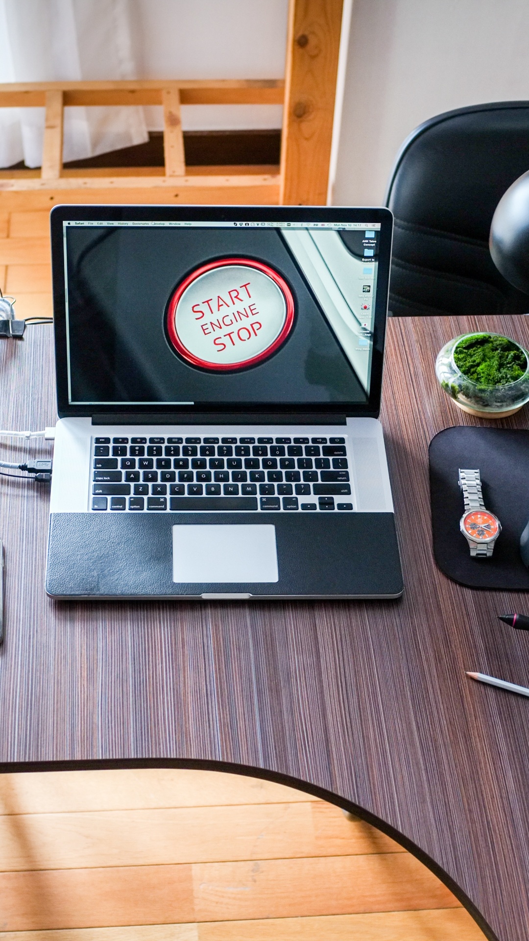 Macbook Pro on Brown Wooden Table. Wallpaper in 1080x1920 Resolution