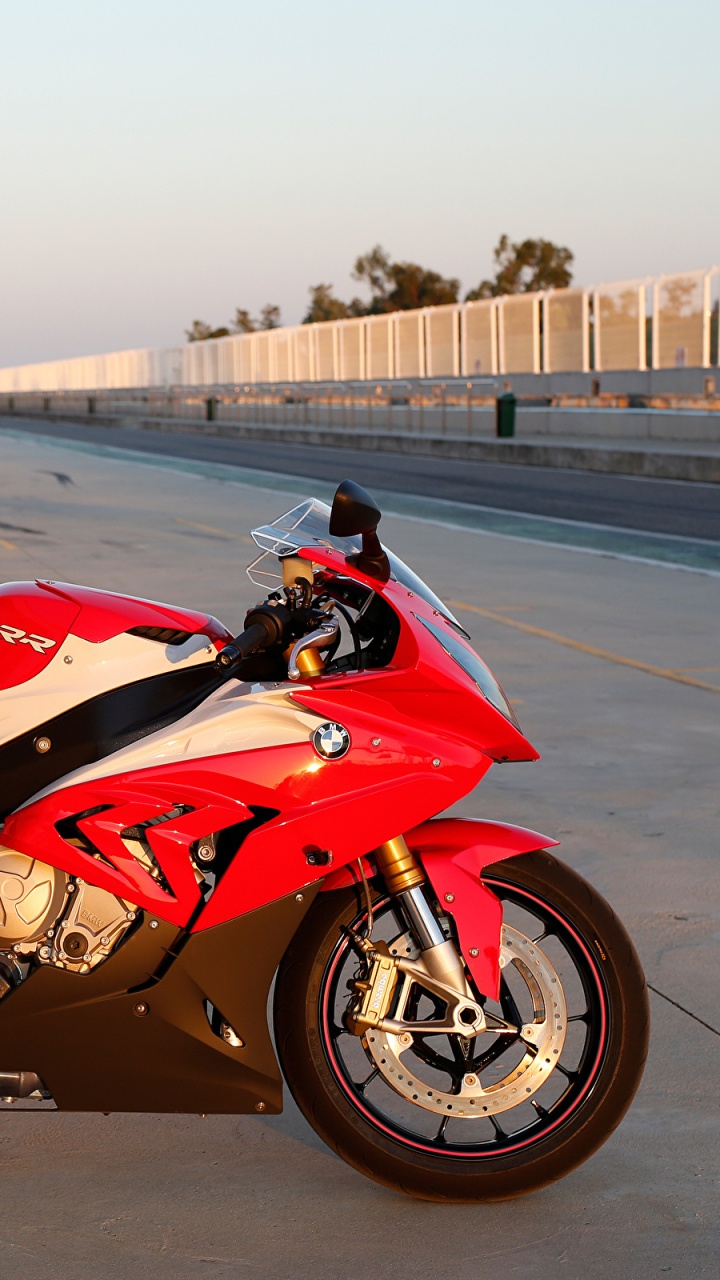 Red and Black Sports Bike Parked on The Side of The Road During Daytime. Wallpaper in 720x1280 Resolution