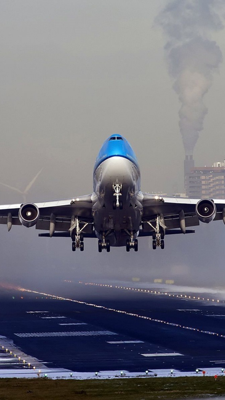 White and Blue Airplane on Airport During Daytime. Wallpaper in 720x1280 Resolution