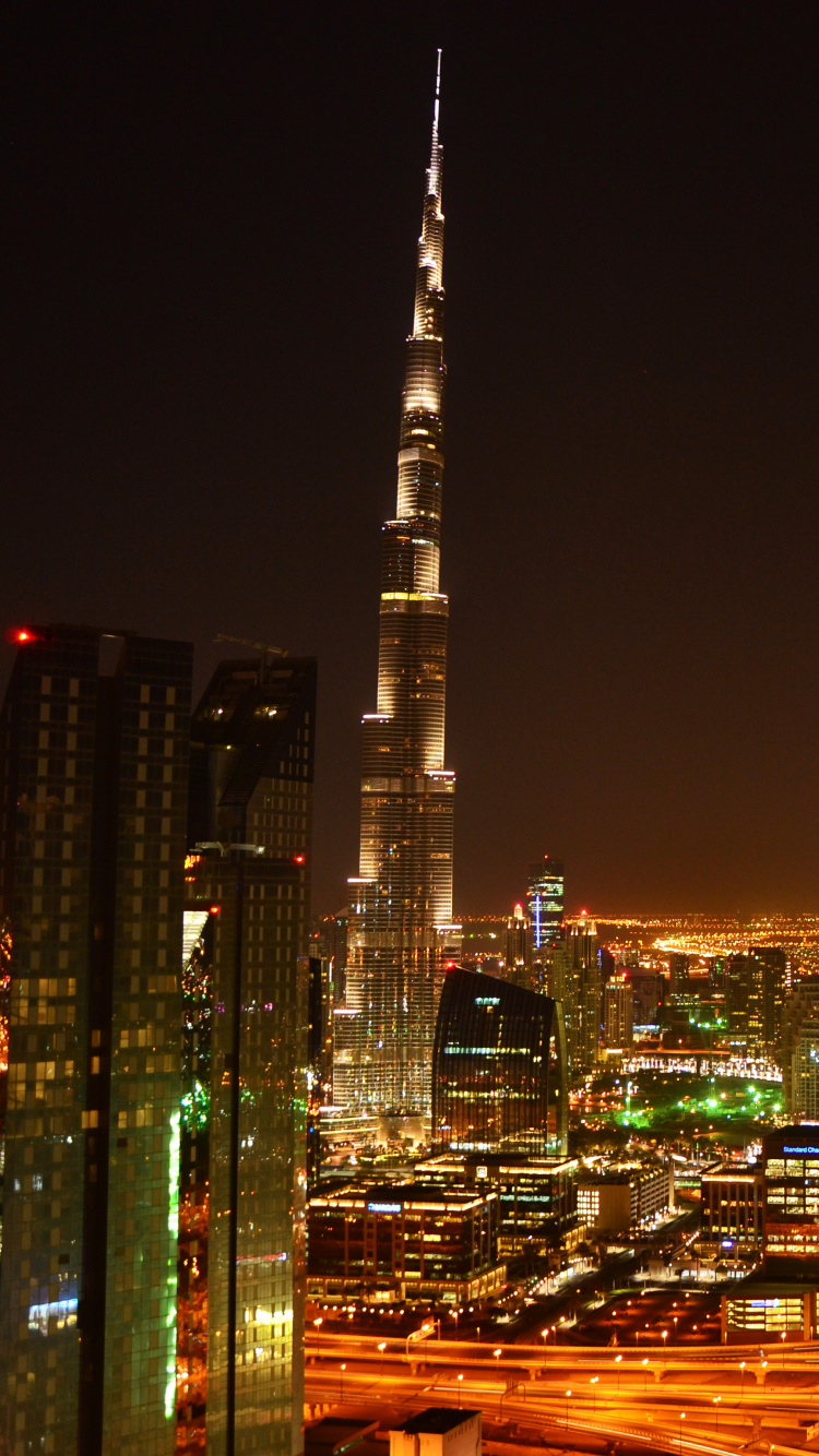 City Skyline During Night Time. Wallpaper in 750x1334 Resolution