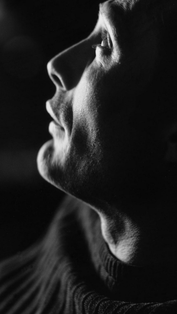 Grayscale Photo of Smiling Man. Wallpaper in 720x1280 Resolution