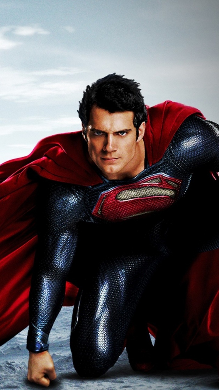 Femme en Écharpe Rouge et Jean Bleu Debout Sur le Sable Gris Pendant la Journée. Wallpaper in 720x1280 Resolution