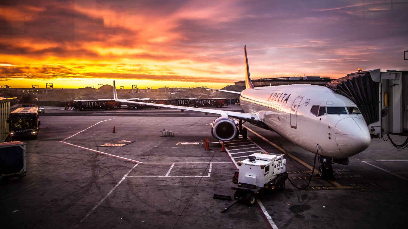 White Passenger Plane on Airport During Sunset. Wallpaper in 1366x768 Resolution