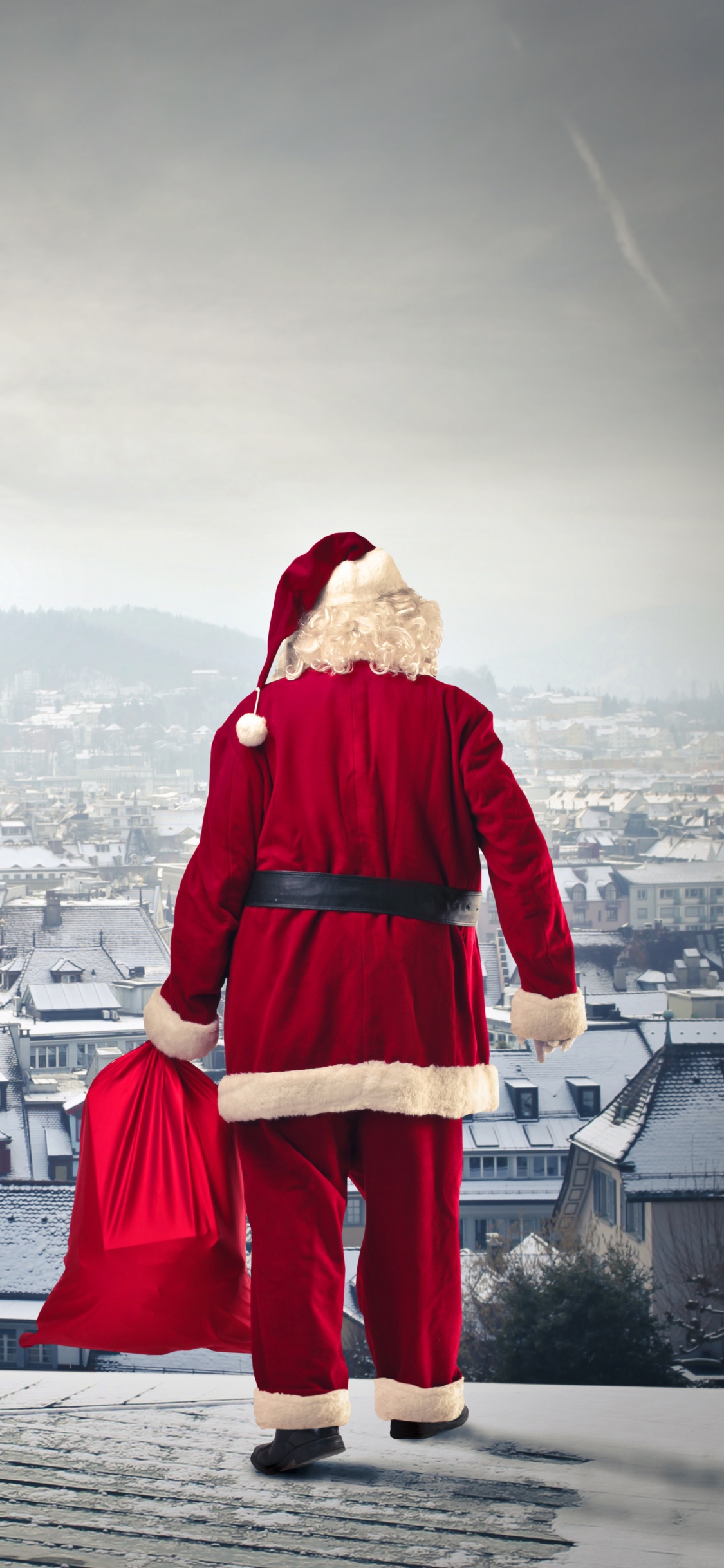 Santa Claus, Christmas Day, Cloud, Tourism, Vacation. Wallpaper in 1125x2436 Resolution