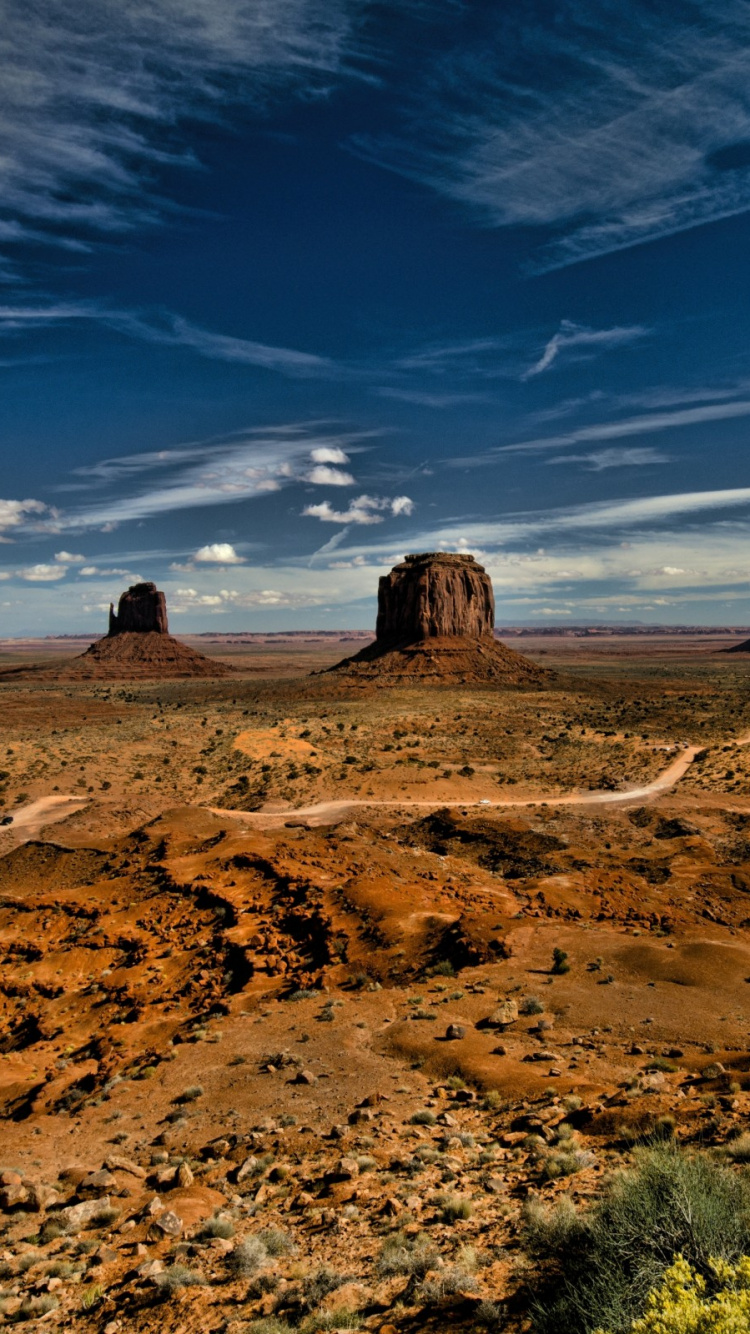 Brown Sand Under Blue Sky During Daytime. Wallpaper in 750x1334 Resolution