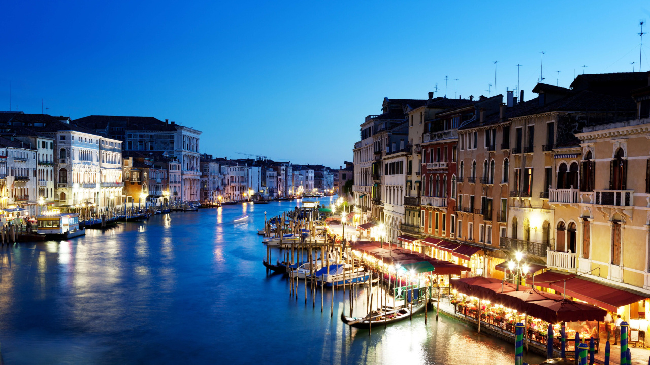 Body of Water Between Buildings During Night Time. Wallpaper in 1280x720 Resolution