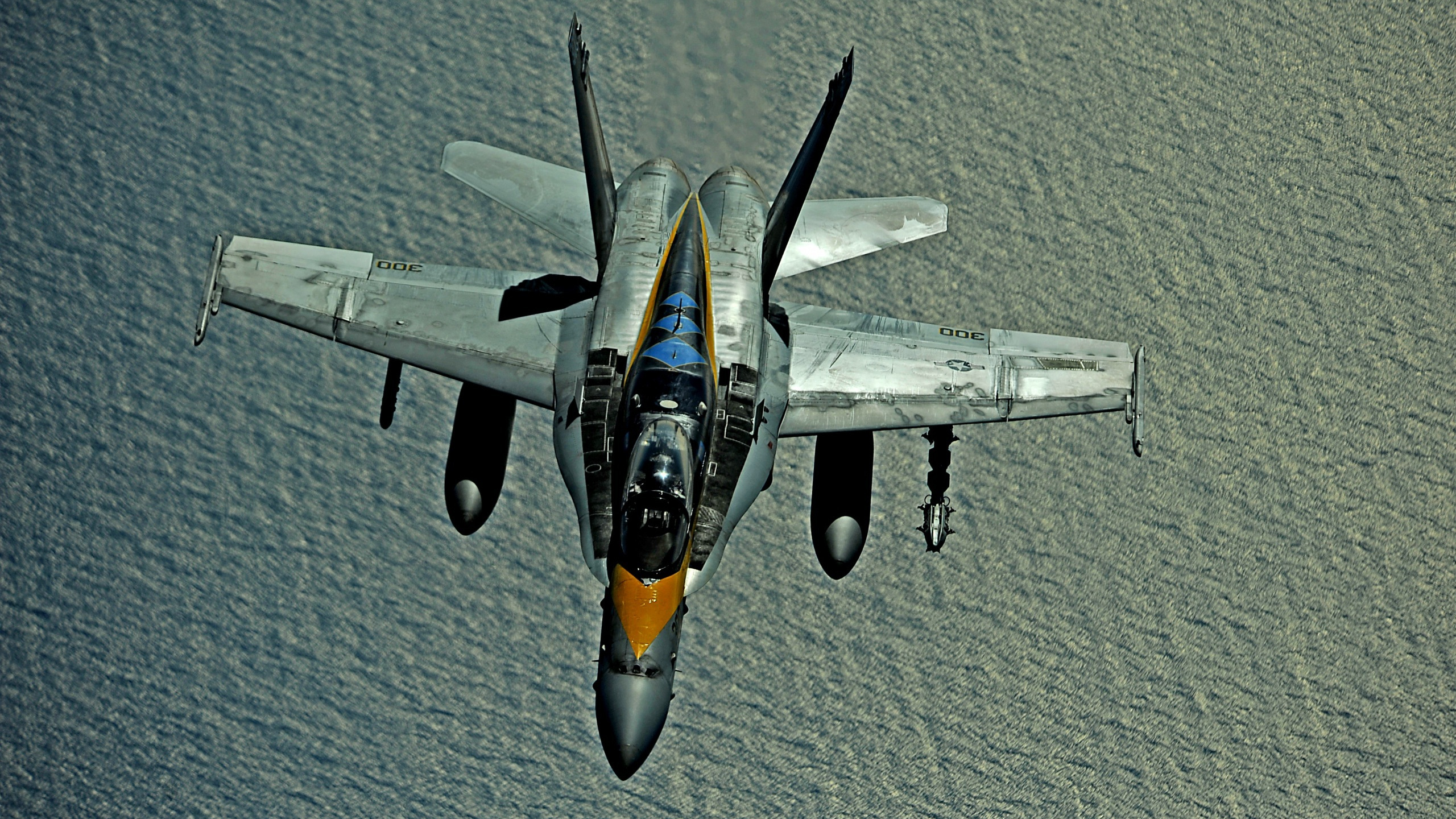 Gray and Yellow Jet Plane Toy. Wallpaper in 2560x1440 Resolution