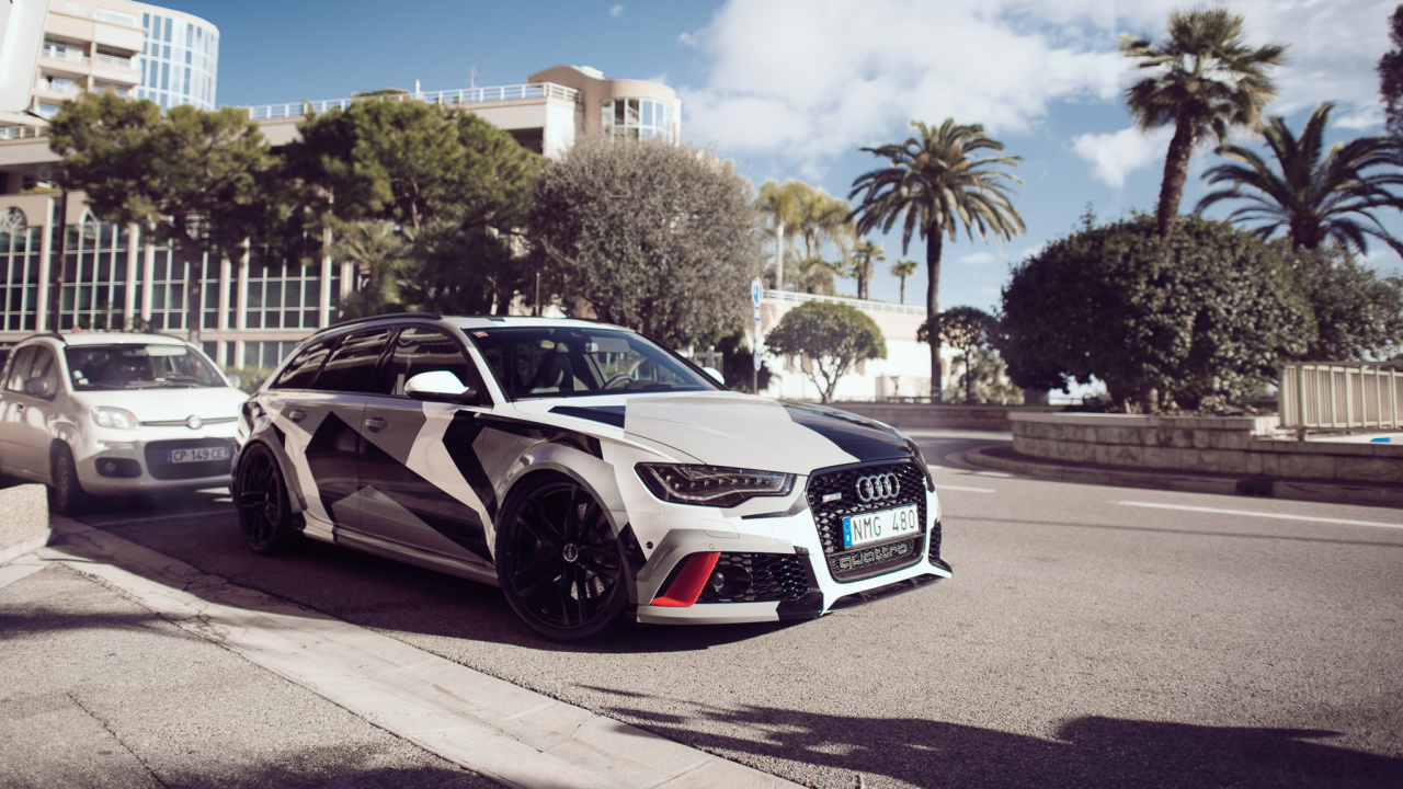 Black Audi r 8 Parked on Gray Asphalt Road During Daytime. Wallpaper in 1280x720 Resolution