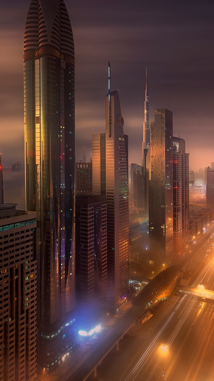 City Buildings During Night Time. Wallpaper in 720x1280 Resolution