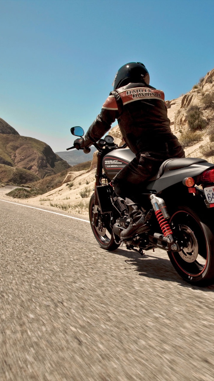 Man Riding on Black and Red Sports Bike on Gray Asphalt Road During Daytime. Wallpaper in 720x1280 Resolution