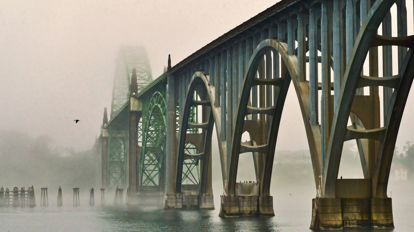 Gray Concrete Bridge Over Water. Wallpaper in 1366x768 Resolution