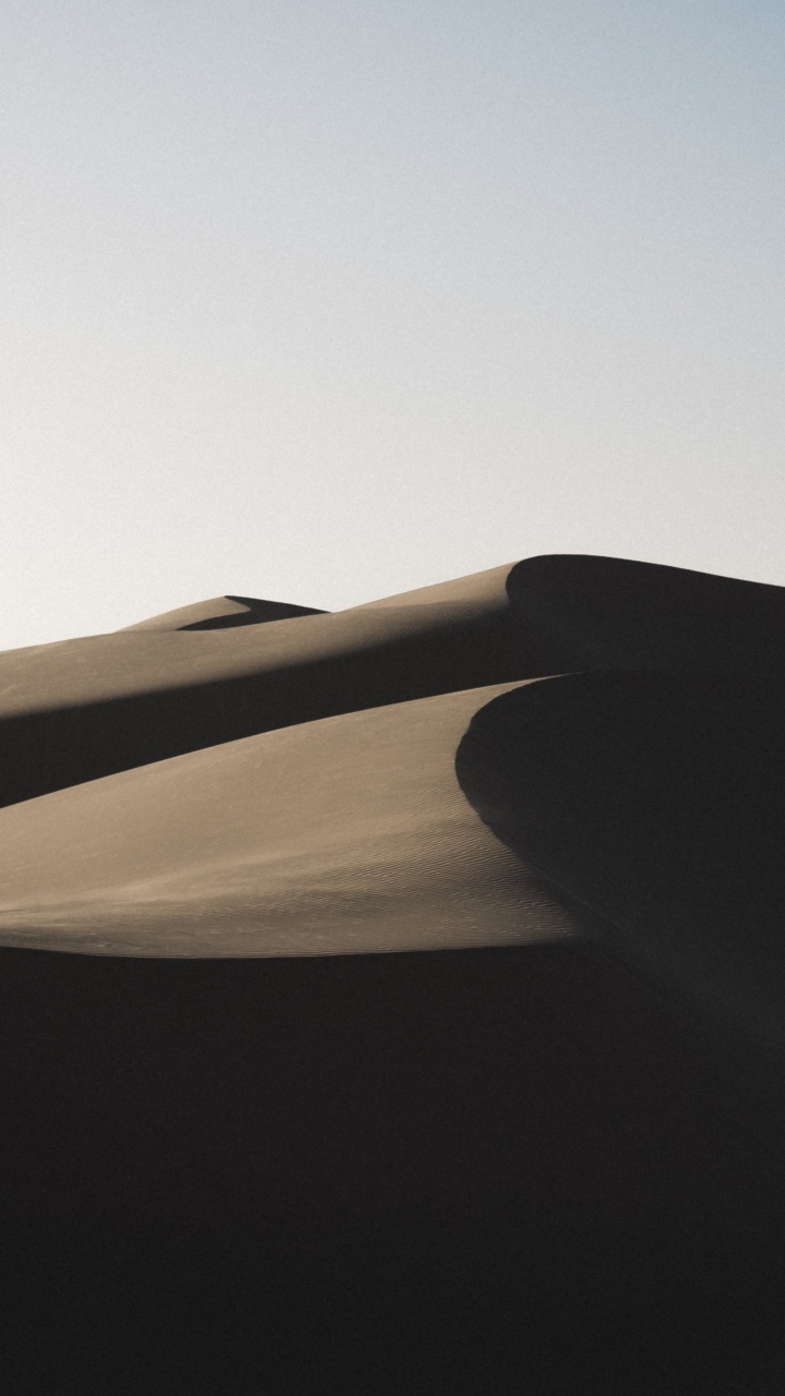 Brown Sand Dunes Under Blue Sky During Daytime. Wallpaper in 720x1280 Resolution