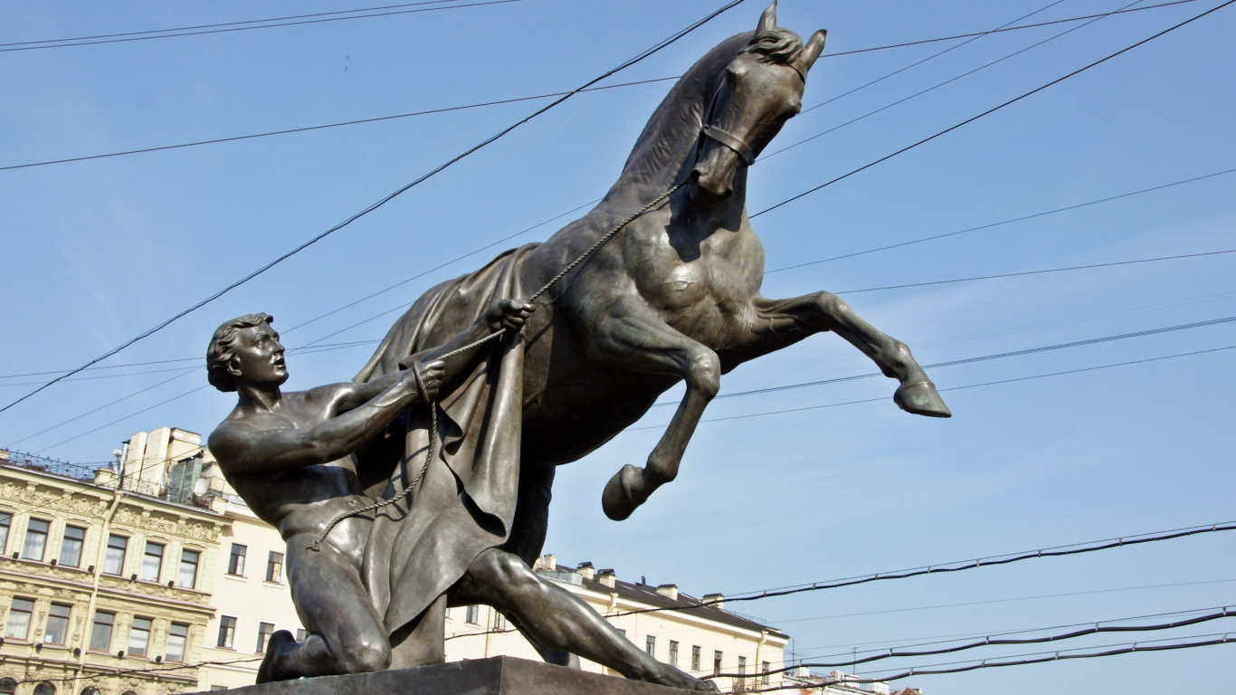 Man Riding Horse Statue Under Blue Sky During Daytime. Wallpaper in 1366x768 Resolution