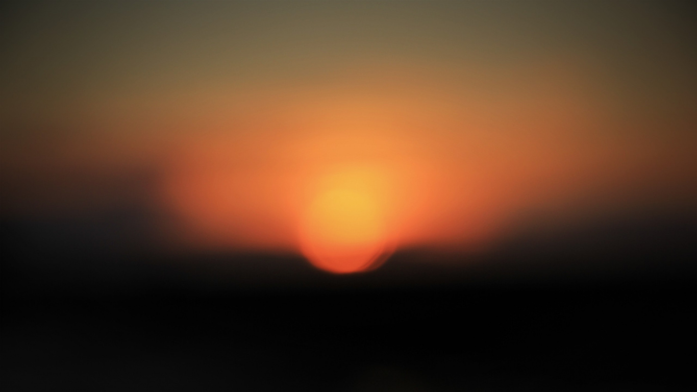 Orange and Black Sun in The Sky. Wallpaper in 1366x768 Resolution