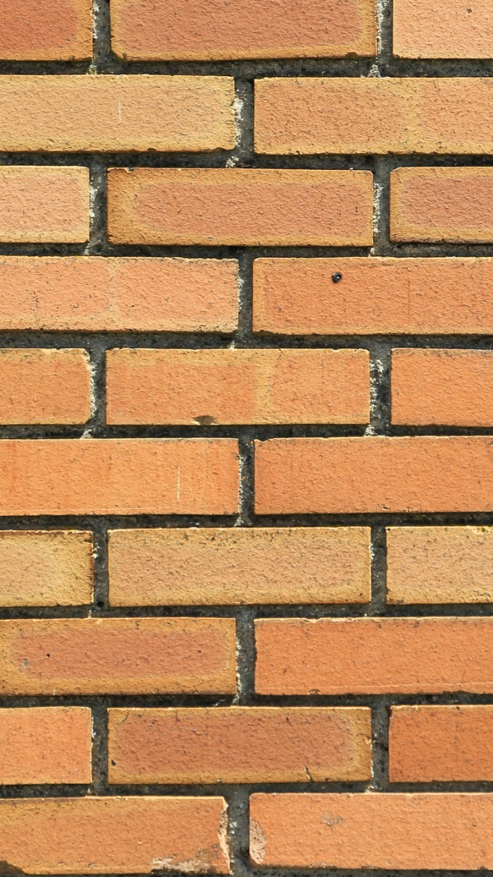 Mur de Briques Brunes et Noires. Wallpaper in 720x1280 Resolution