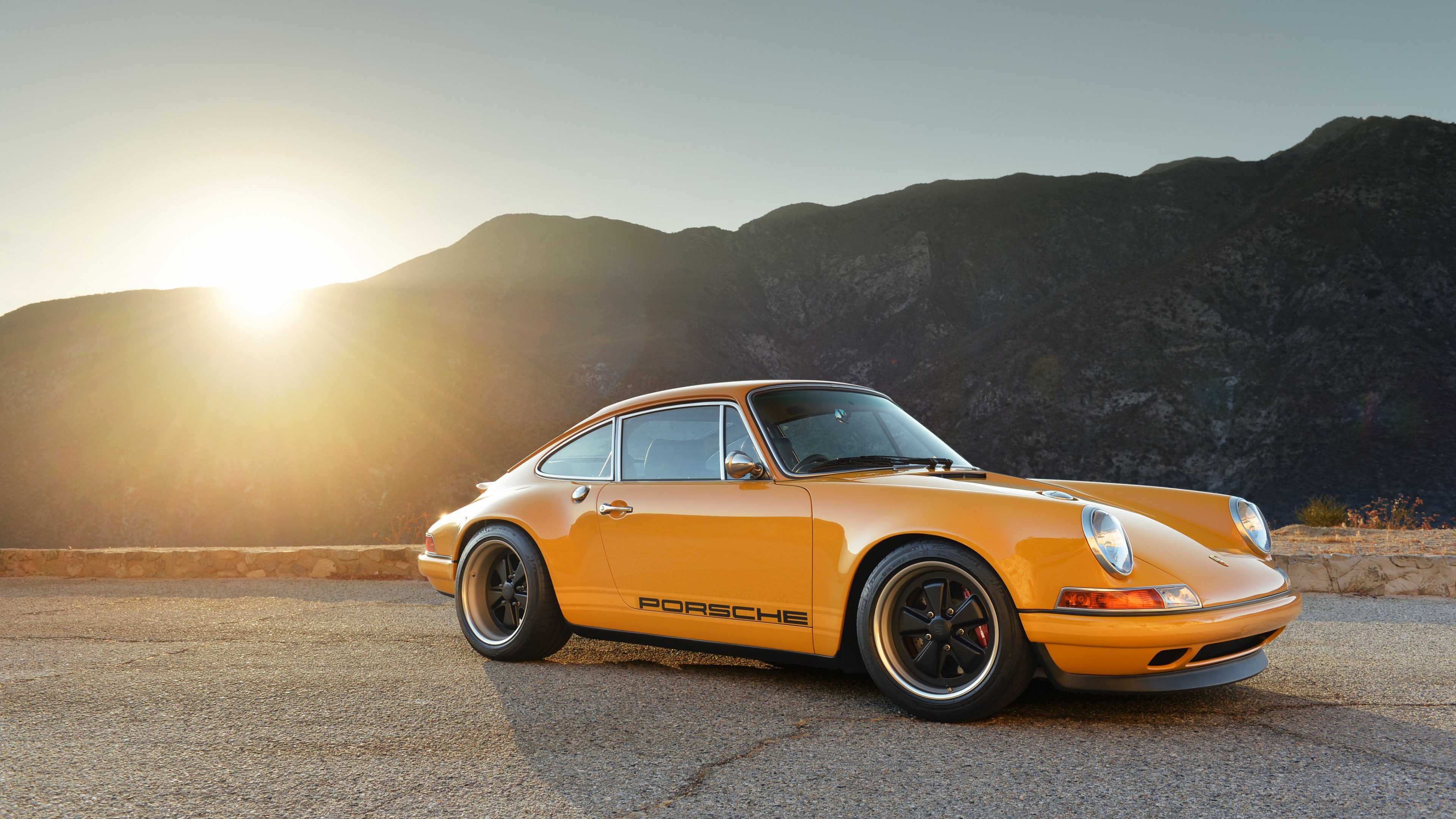 Yellow Porsche 911 on Brown Dirt Road During Daytime. Wallpaper in 3840x2160 Resolution