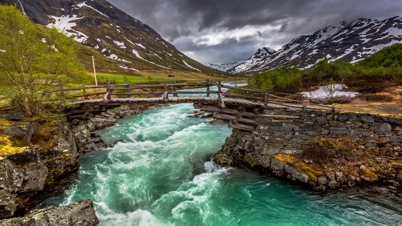 Green Lake Near Mountain Under White Clouds During Daytime. Wallpaper in 1366x768 Resolution