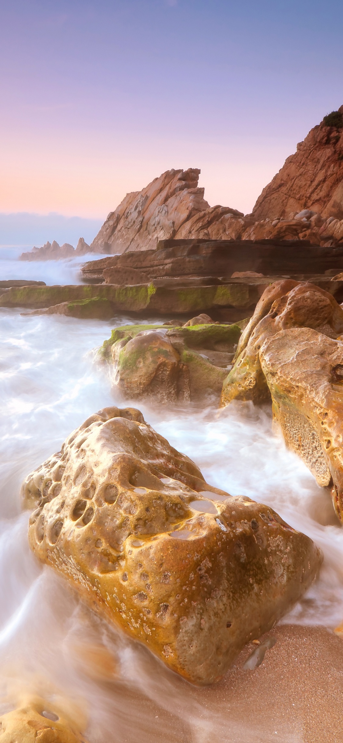 Brown Rock Formation on Sea During Daytime. Wallpaper in 1125x2436 Resolution