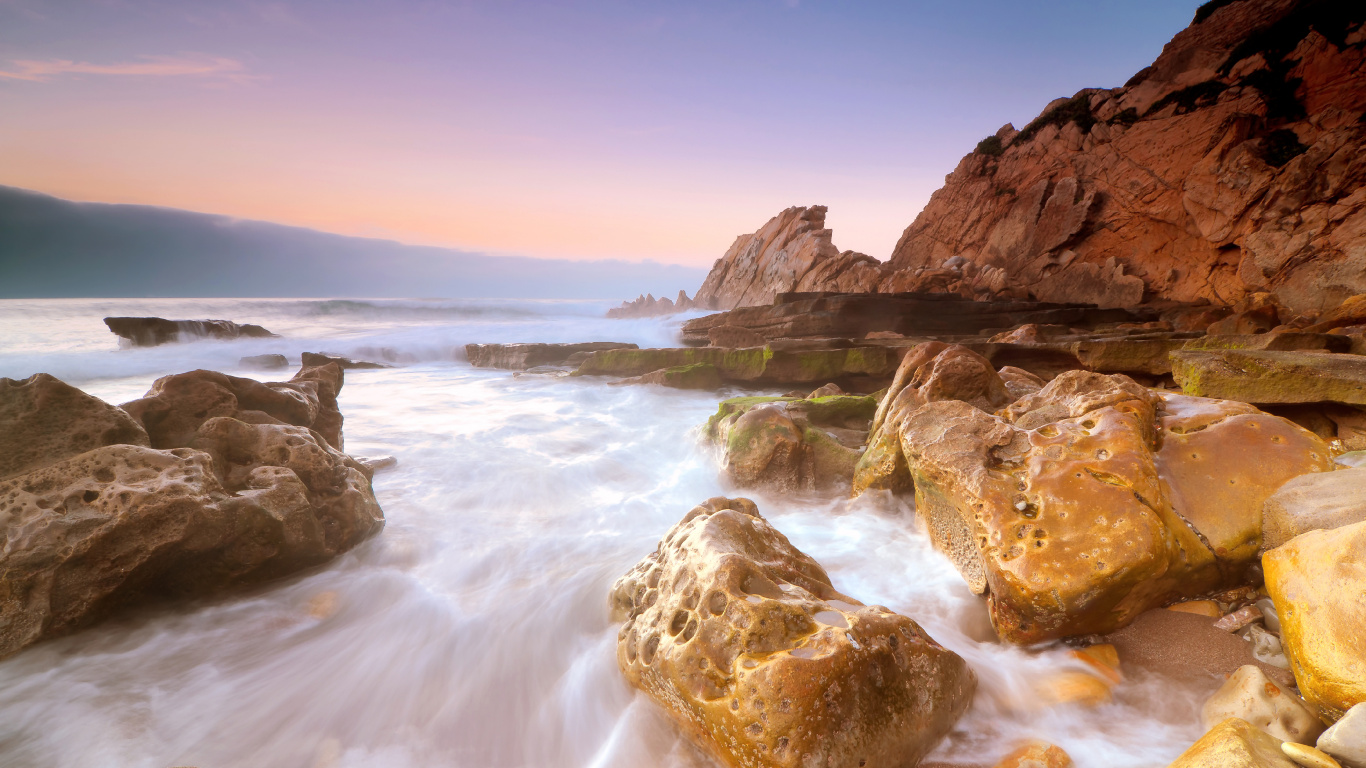 Brown Rock Formation on Sea During Daytime. Wallpaper in 1366x768 Resolution