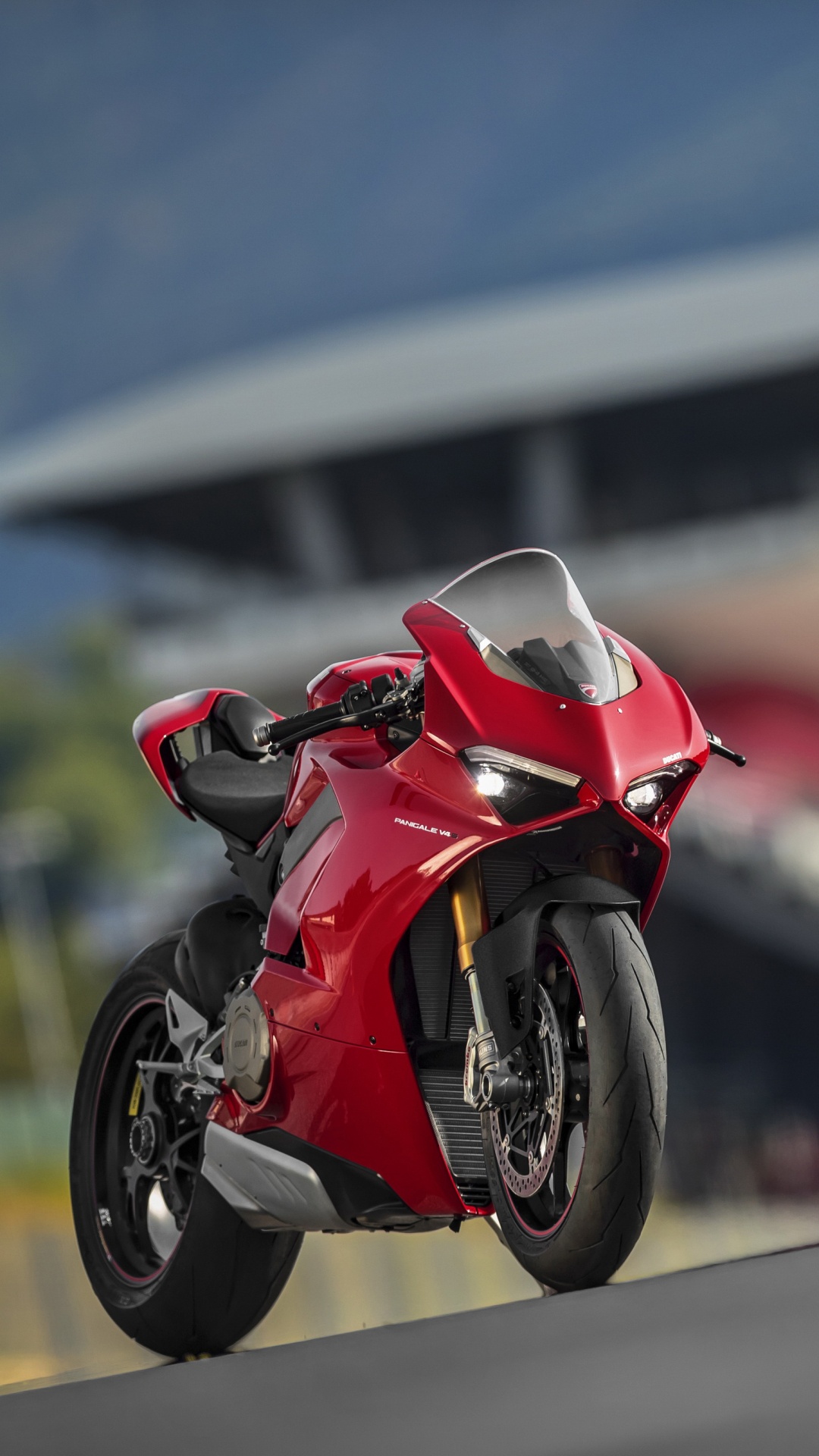 Red and Black Sports Bike Parked on The Road During Daytime. Wallpaper in 1080x1920 Resolution