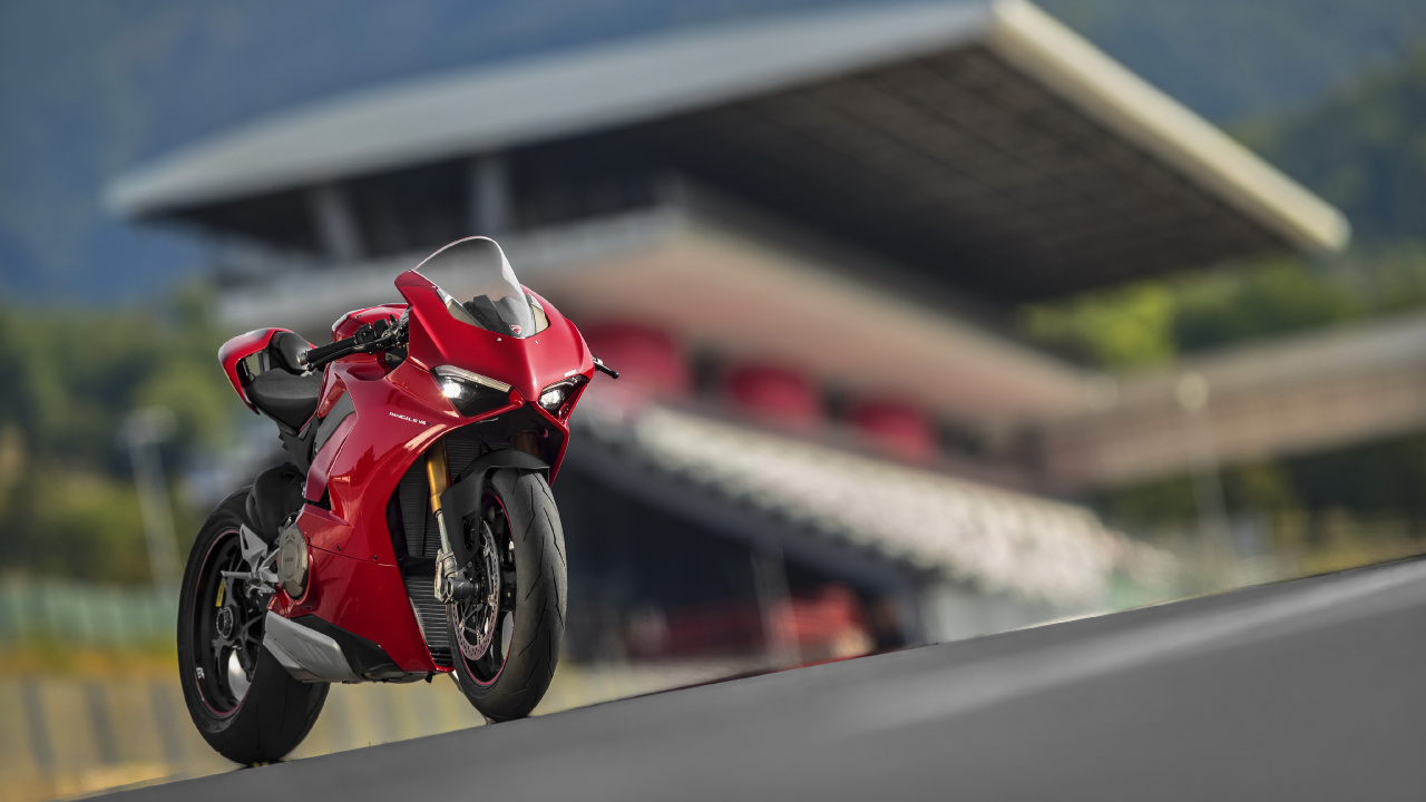 Red and Black Sports Bike Parked on The Road During Daytime. Wallpaper in 1280x720 Resolution