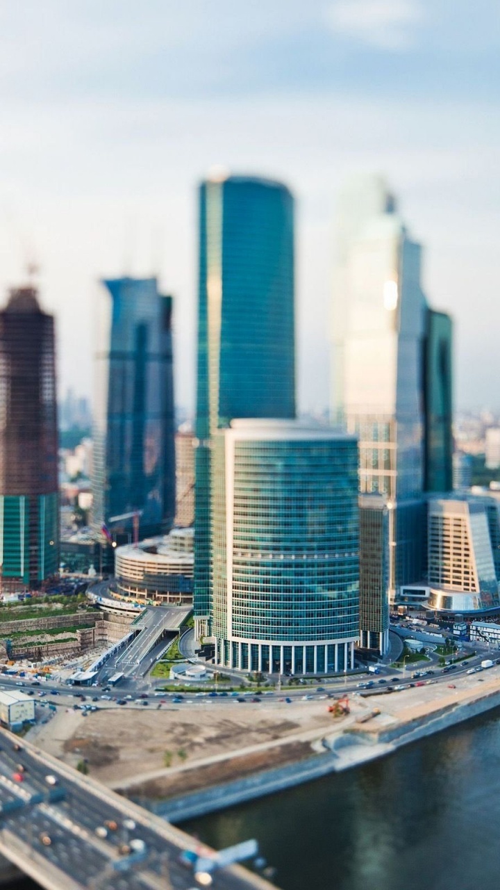 High Rise Buildings Near Body of Water During Daytime. Wallpaper in 720x1280 Resolution