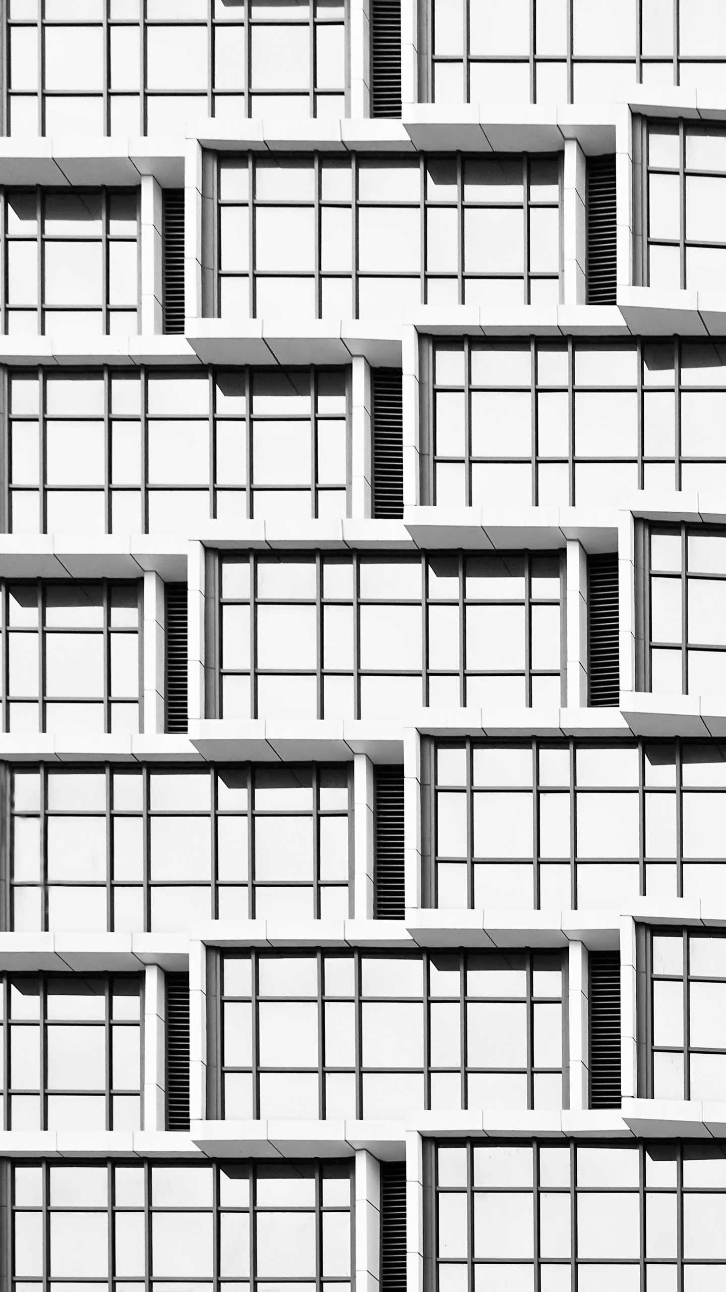 Weißes Betongebäude Tagsüber. Wallpaper in 1440x2560 Resolution