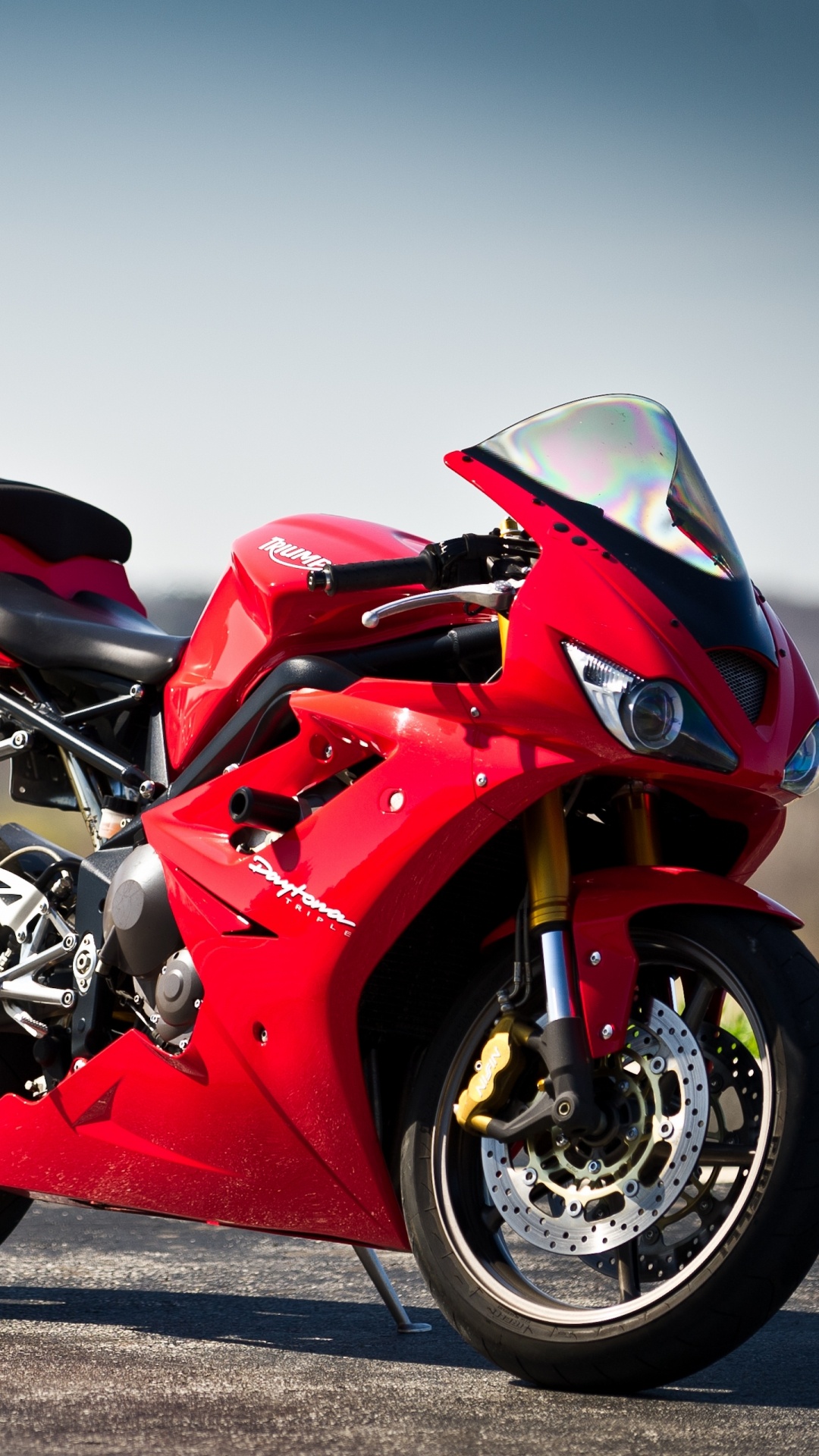 Red and Black Sports Bike on Road During Daytime. Wallpaper in 1080x1920 Resolution