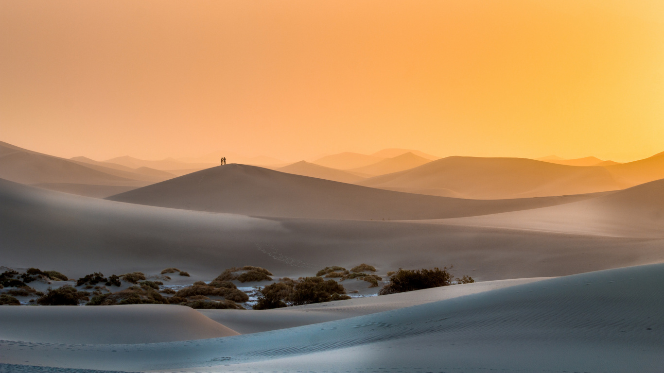 Person Walking on Desert During Daytime. Wallpaper in 1366x768 Resolution