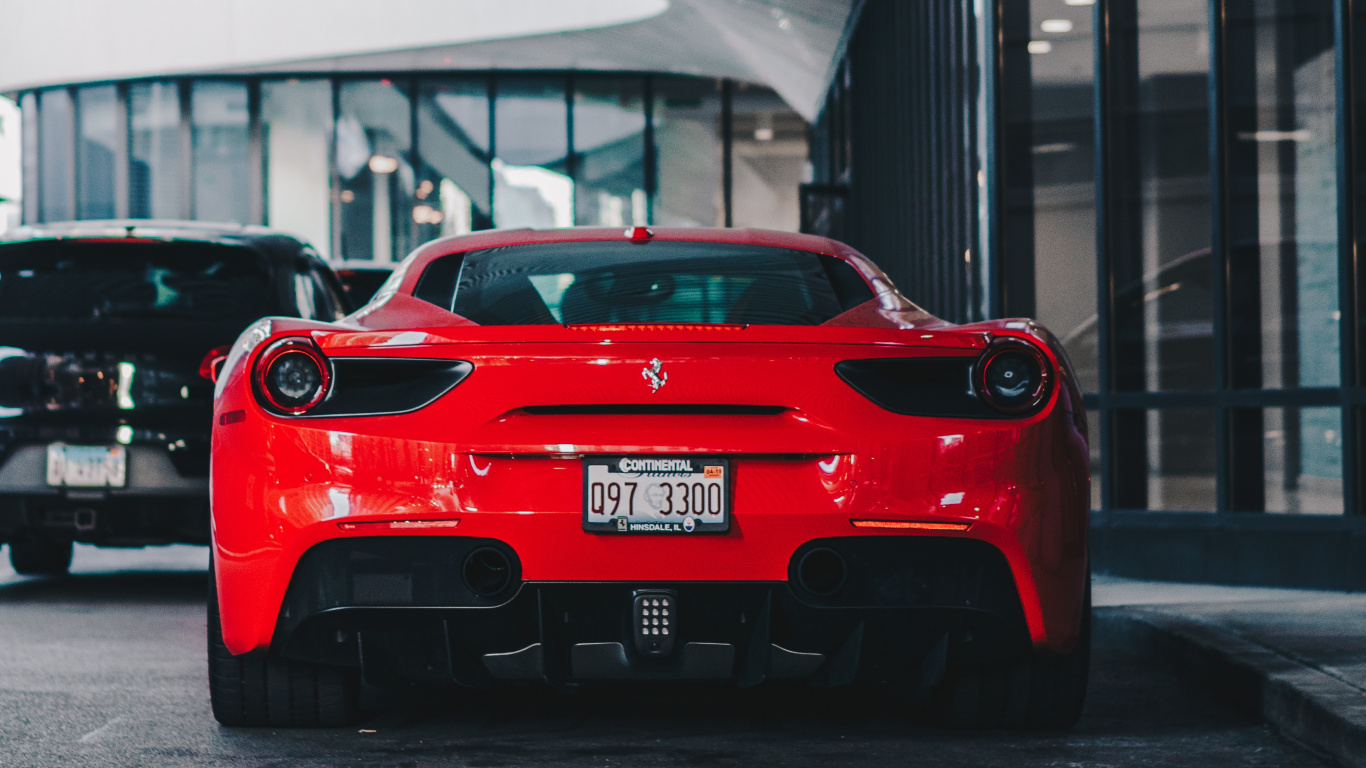 Red Ferrari Car Parked Near Building. Wallpaper in 1366x768 Resolution