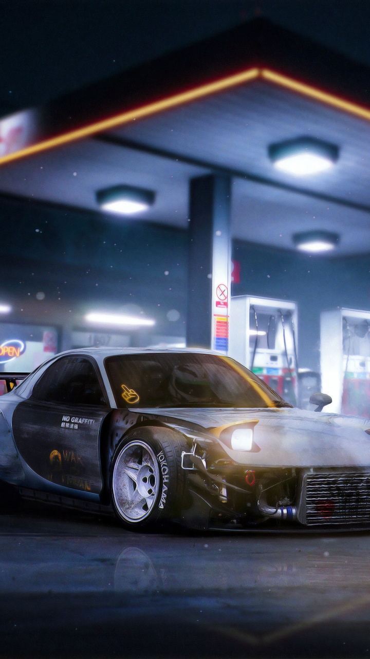 Black Sedan Parked in Front of White Building. Wallpaper in 720x1280 Resolution