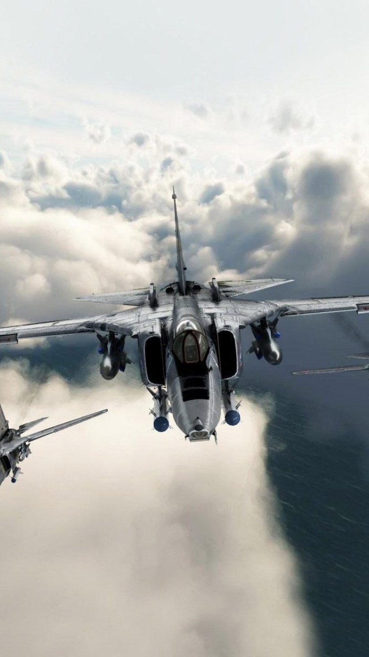 Fighter Plane on The Sky During Daytime. Wallpaper in 720x1280 Resolution