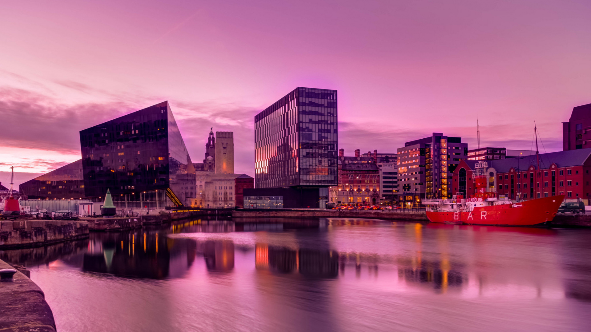 City Skyline Near Body of Water During Sunset. Wallpaper in 1920x1080 Resolution
