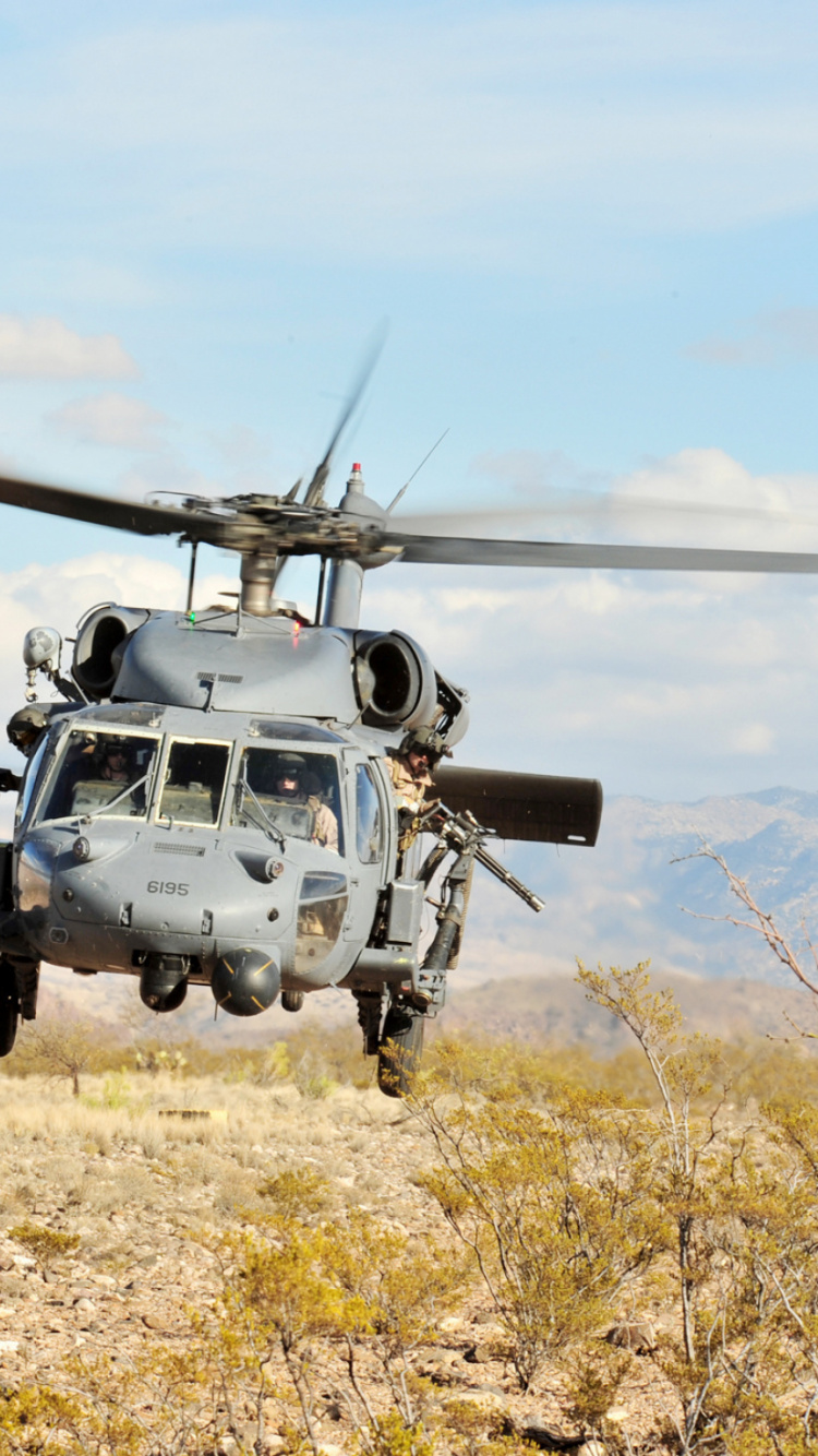 White Helicopter on Brown Field During Daytime. Wallpaper in 750x1334 Resolution