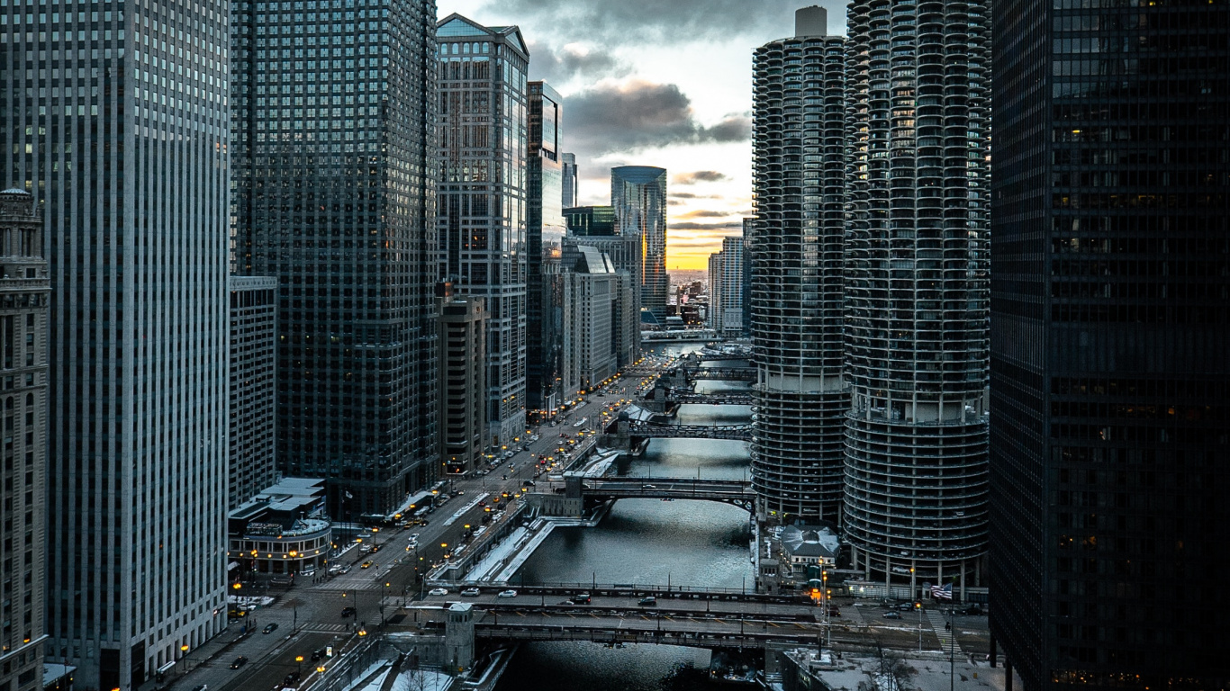 Cars on Road Between High Rise Buildings During Daytime. Wallpaper in 1366x768 Resolution