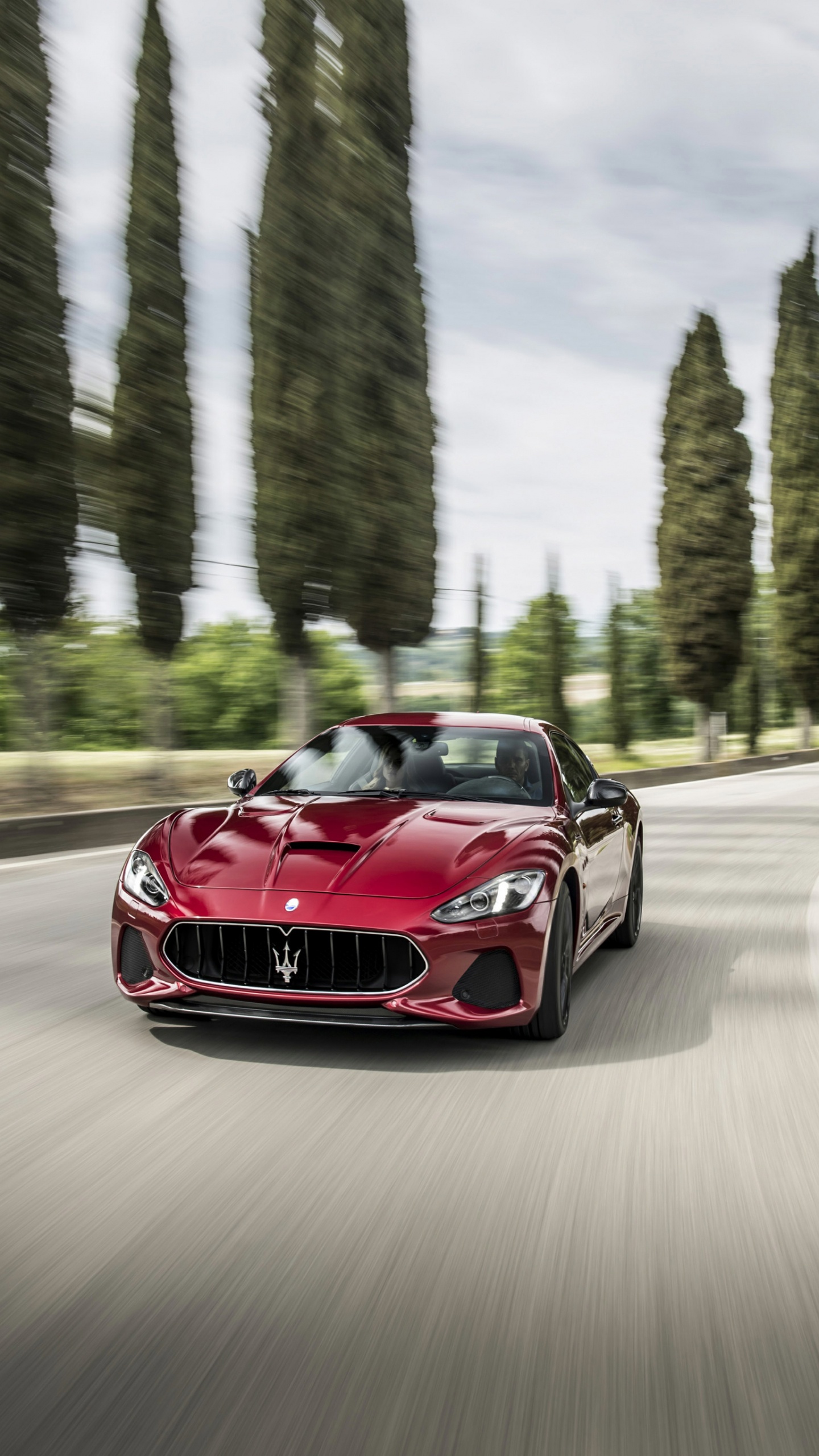 Red Ferrari Sports Car on Road During Daytime. Wallpaper in 1440x2560 Resolution