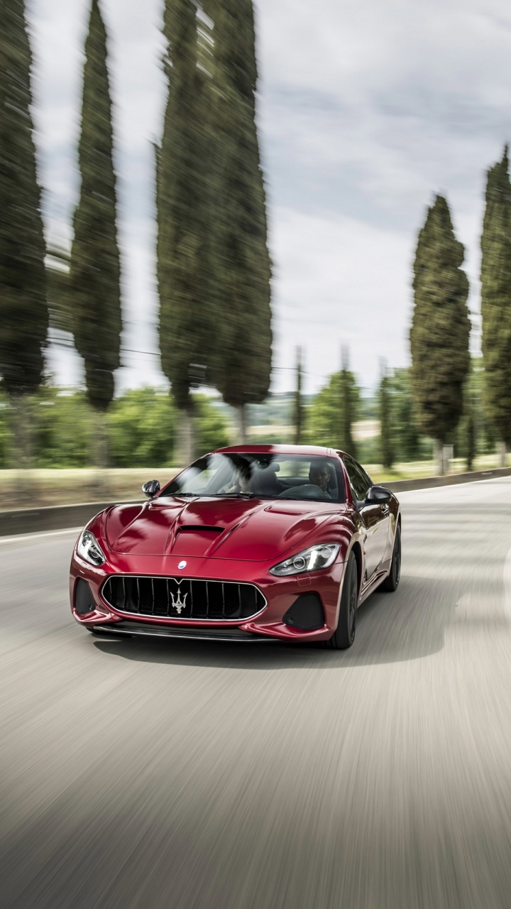 Red Ferrari Sports Car on Road During Daytime. Wallpaper in 720x1280 Resolution