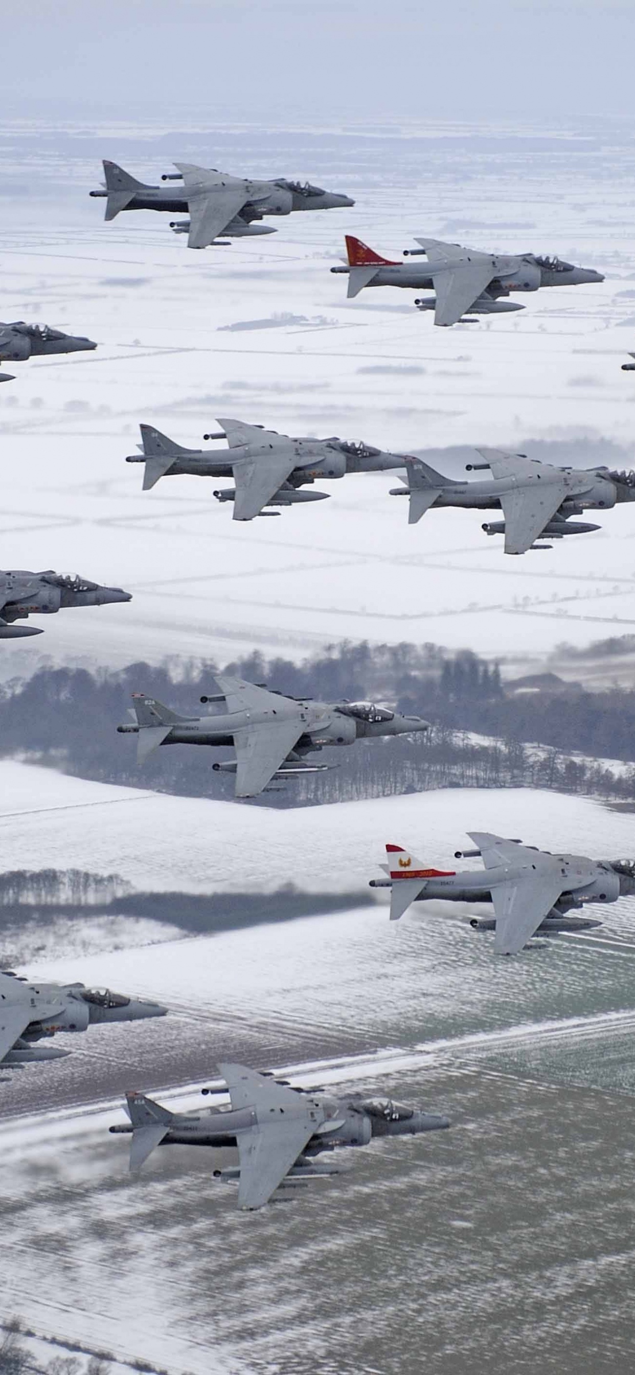 White and Red Jet Plane on Snow Covered Ground During Daytime. Wallpaper in 1242x2688 Resolution