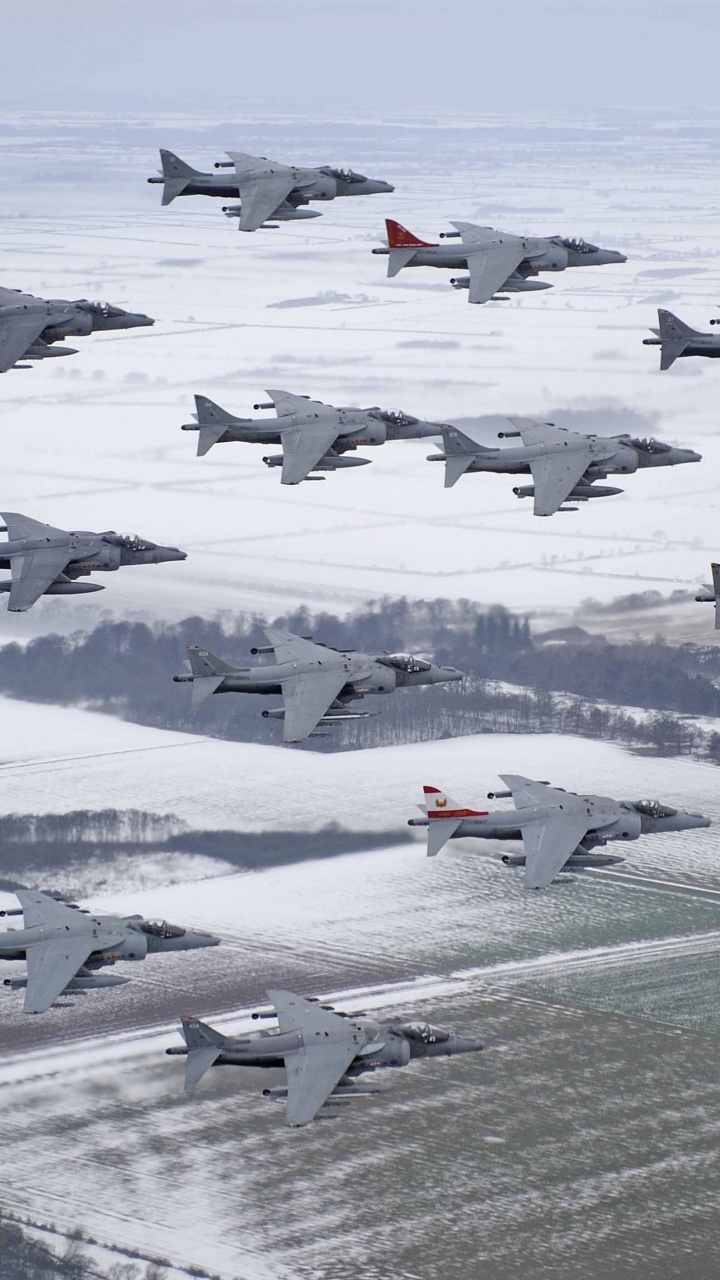 White and Red Jet Plane on Snow Covered Ground During Daytime. Wallpaper in 720x1280 Resolution
