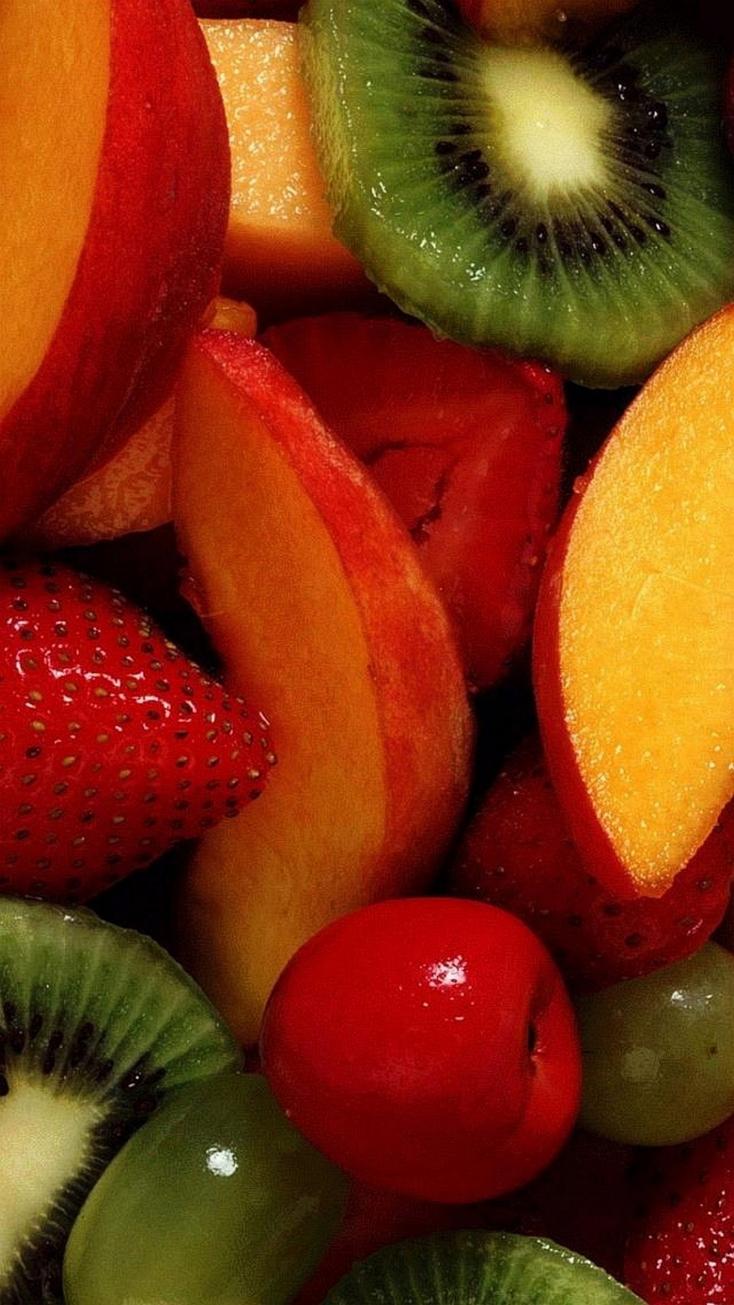 Sliced Fruits on White Ceramic Plate. Wallpaper in 1440x2560 Resolution