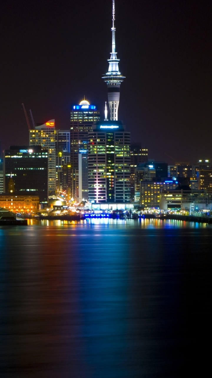 City Skyline During Night Time. Wallpaper in 720x1280 Resolution