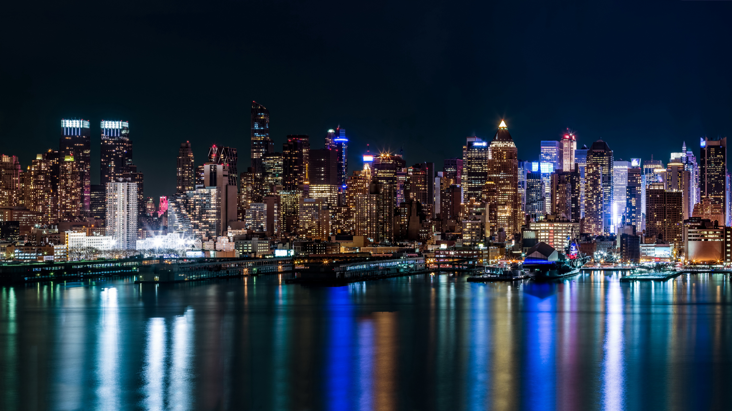 City Skyline During Night Time. Wallpaper in 2560x1440 Resolution