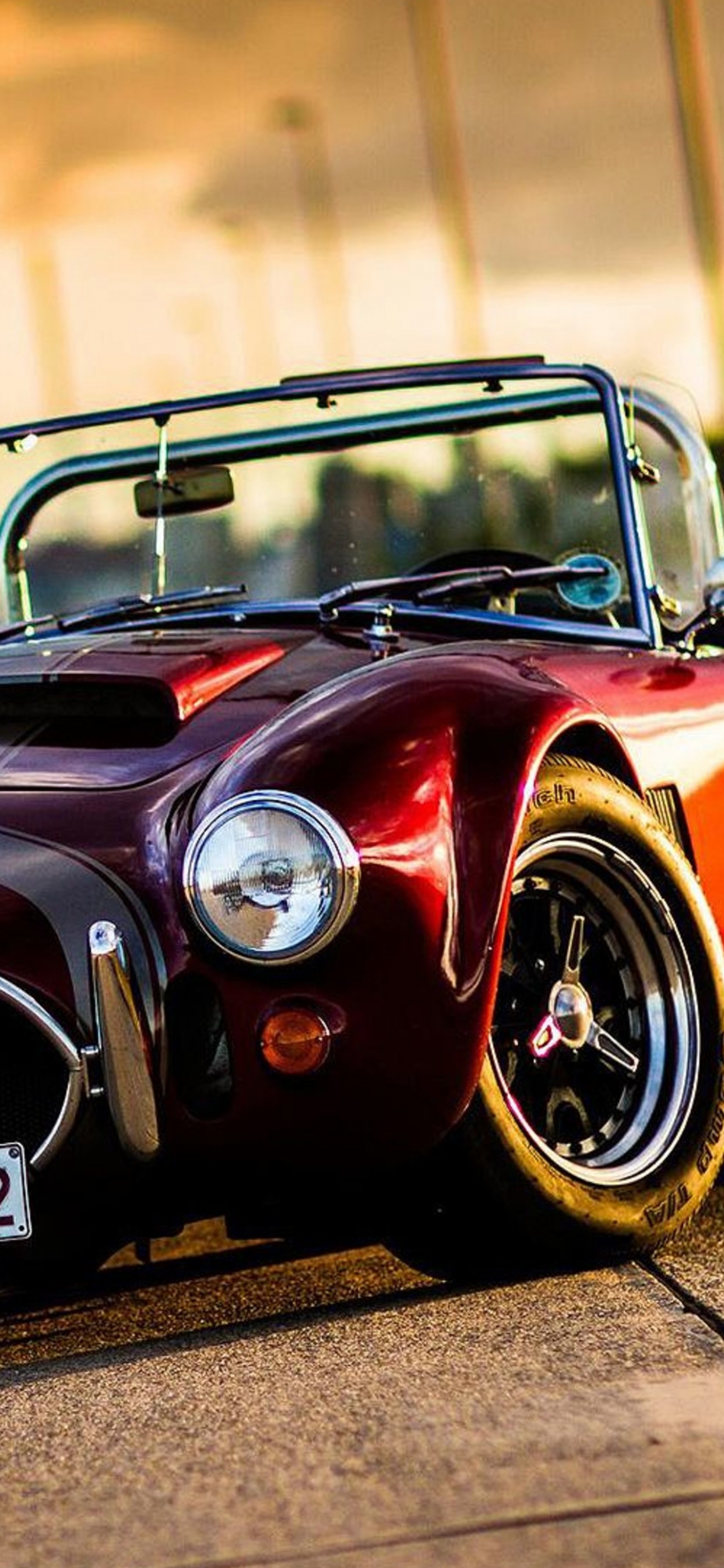 Red and Black Porsche 911. Wallpaper in 1242x2688 Resolution