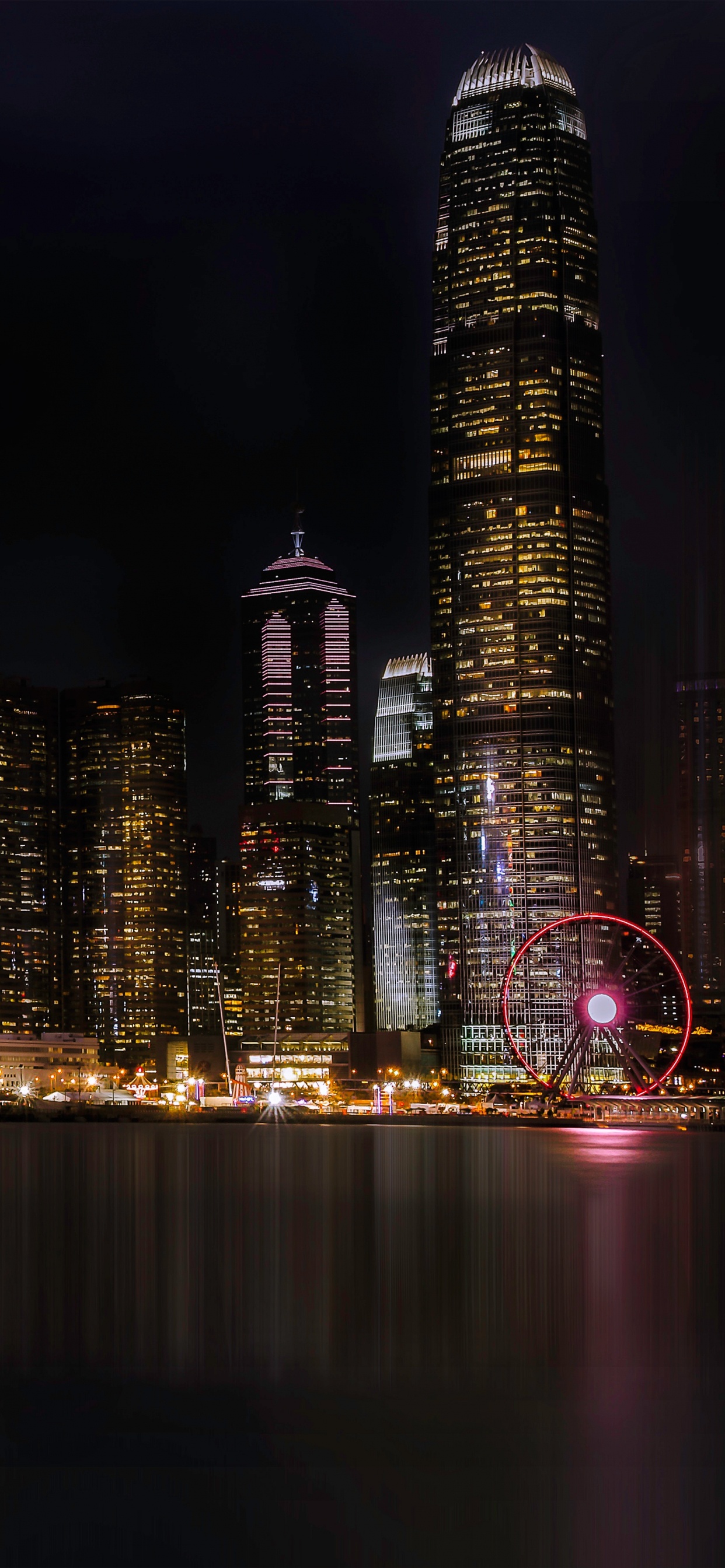 City Skyline During Night Time. Wallpaper in 1242x2688 Resolution