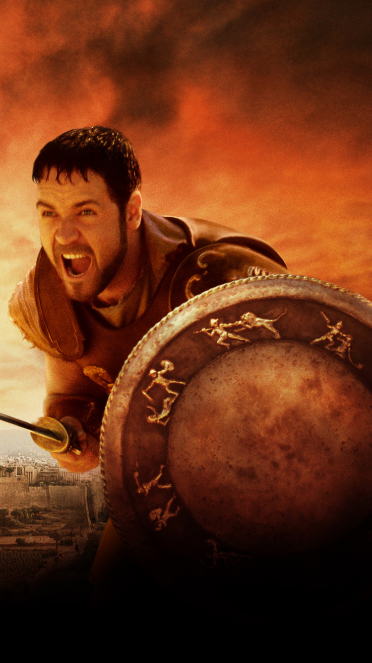 Homme en Veste Marron Tenant un Métal Rond. Wallpaper in 750x1334 Resolution