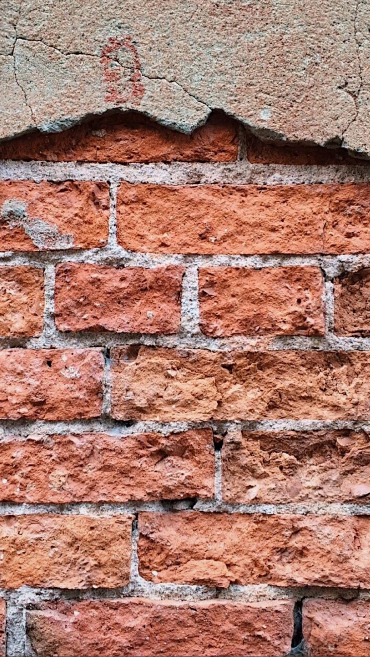 Braune Und Graue Mauer. Wallpaper in 720x1280 Resolution