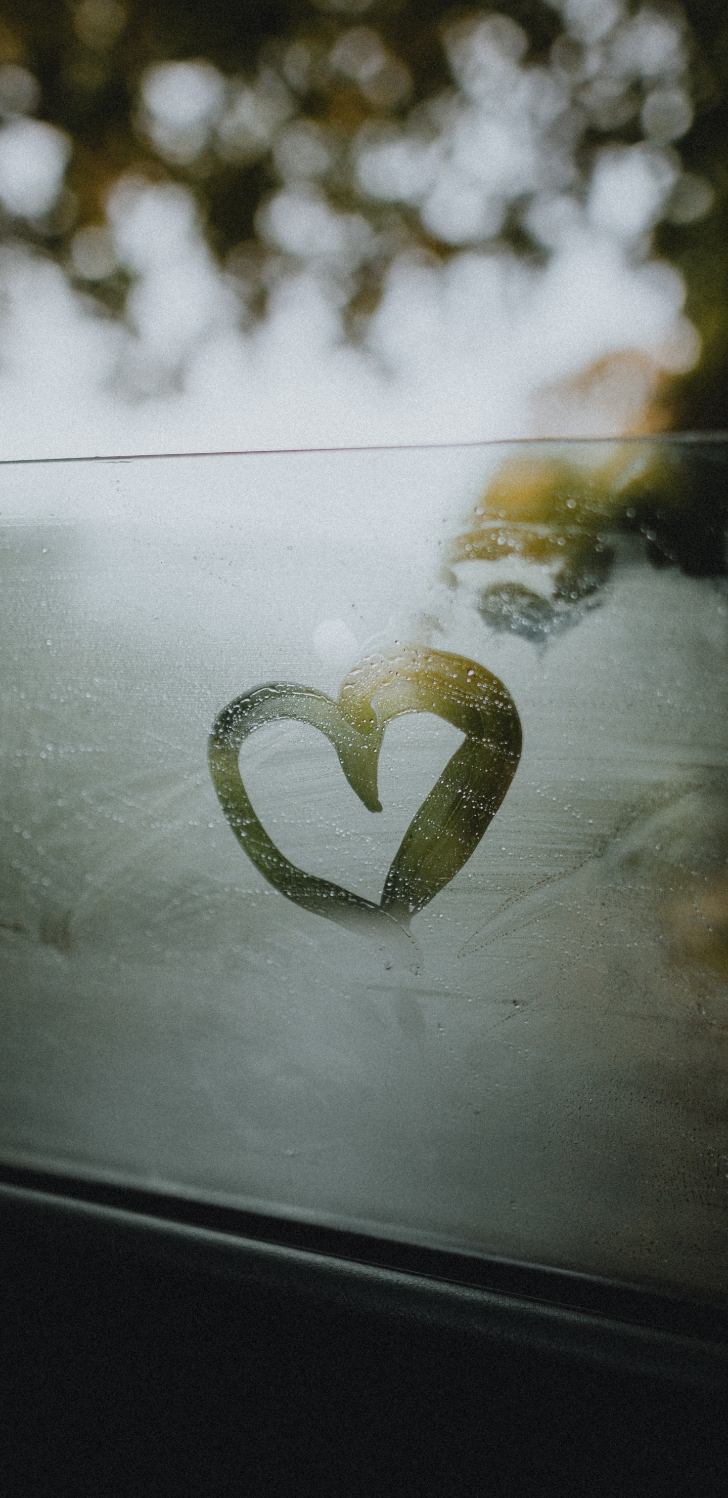 White Heart Shaped Ornament on Black Surface. Wallpaper in 1440x2960 Resolution